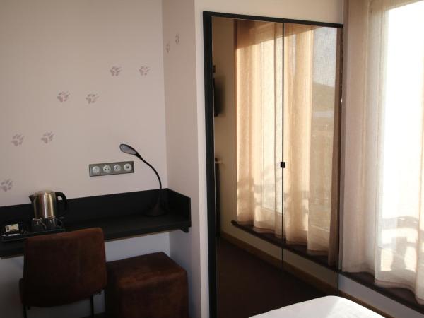 Les Loges Du Parc : photo 4 de la chambre chambre double ou lits jumeaux standard - annexe