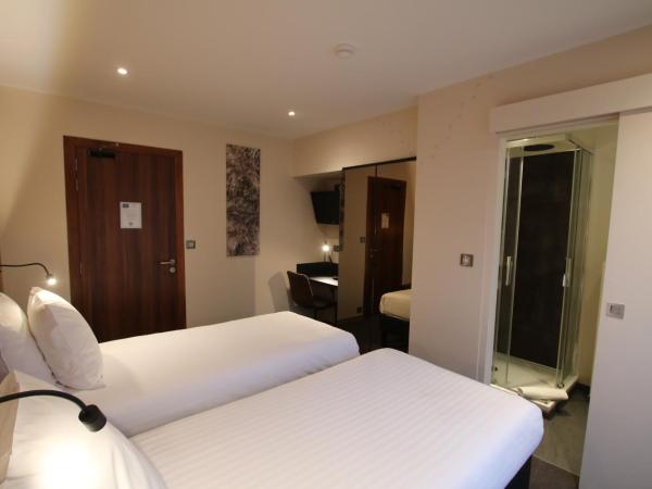 Les Loges Du Parc : photo 9 de la chambre chambre double ou lits jumeaux standard - annexe