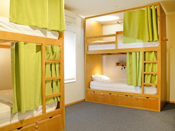 Peach Hostel & Suites : photo 1 de la chambre lit dans dortoir de 8 lits