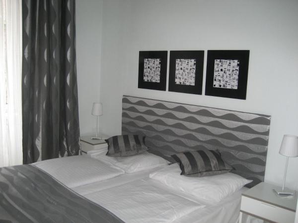 Pension Schottentor : photo 1 de la chambre chambre quadruple