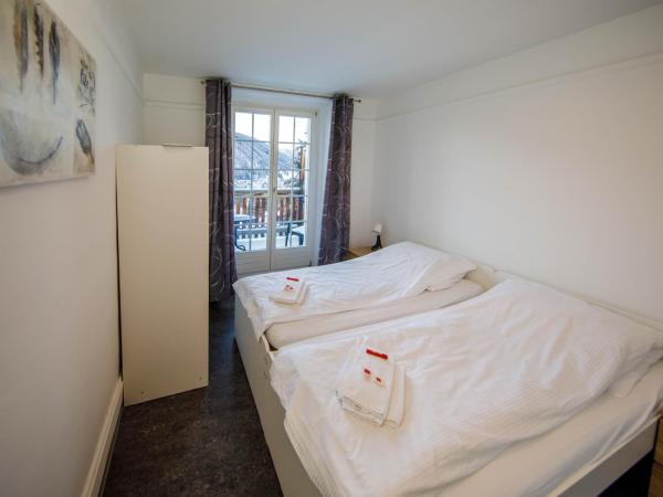 Zentrum Haus Davos : photo 9 de la chambre chambre double avec salle de bains privative