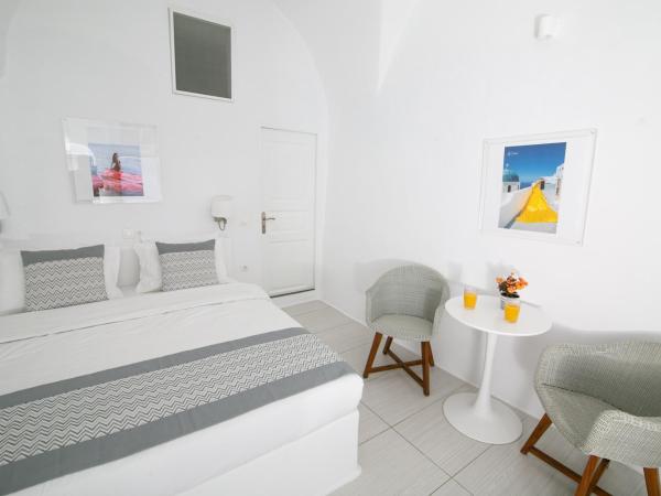 Vogue Suites : photo 6 de la chambre studio troglodyte standard - vue sur mer et caldera