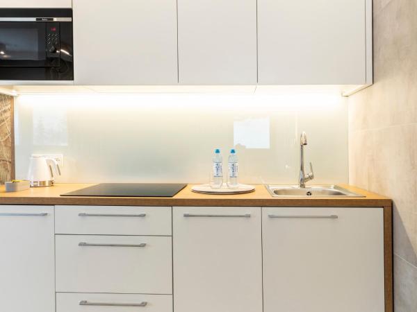 Royal Hill Residence : photo 5 de la chambre appartement avec terrasse