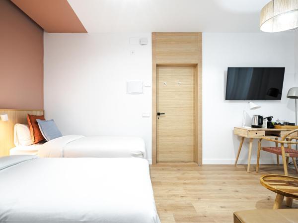 Vallecas Suites by Olala Homes : photo 10 de la chambre chambre quadruple