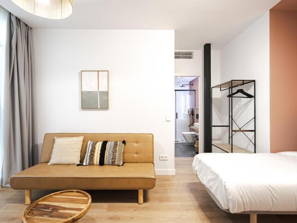 Vallecas Suites by Olala Homes : photo 6 de la chambre chambre quadruple