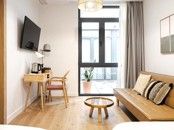 Vallecas Suites by Olala Homes : photo 9 de la chambre chambre quadruple