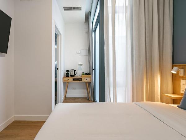 Vallecas Suites by Olala Homes : photo 3 de la chambre chambre double