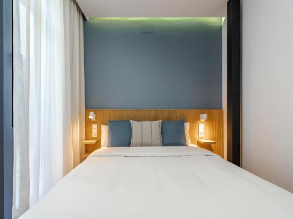 Vallecas Suites by Olala Homes : photo 2 de la chambre chambre double