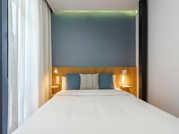 Vallecas Suites by Olala Homes : photo 8 de la chambre chambre double