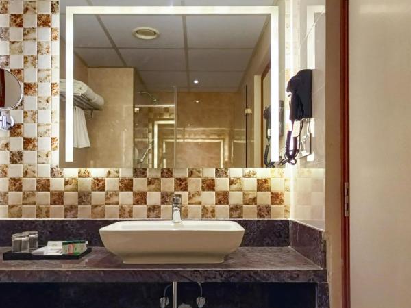 Quality Inn Rockwell Grand, Bangalore : photo 1 de la chambre chambre lits jumeaux supérieure - vue sur jardin