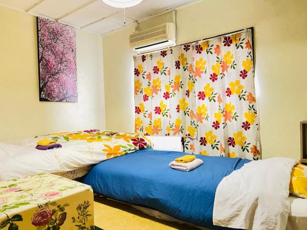 IM guest house : photo 1 de la chambre chambre familiale avec salle de bains commune