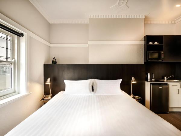 Como Court Budget Accommodation : photo 1 de la chambre studio lit king-size