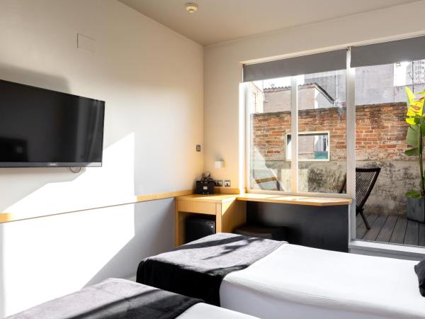 Onix Liceo : photo 9 de la chambre chambre double ou lits jumeaux avec terrasse