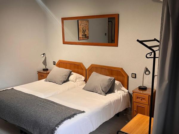 Hostal Arenal : photo 7 de la chambre chambre lits jumeaux