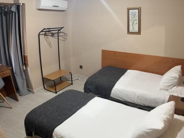 Hostal Arenal : photo 4 de la chambre chambre double ou lits jumeaux