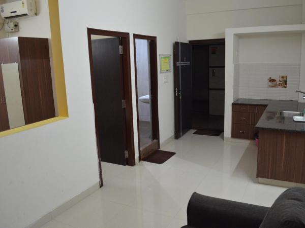 Grand Suites Yelahanka : photo 4 de la chambre chambre double ou lits jumeaux