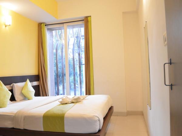 Grand Suites Yelahanka : photo 2 de la chambre chambre double ou lits jumeaux