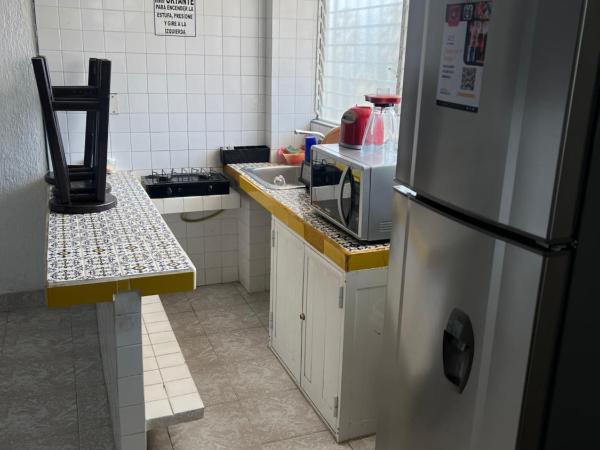 Hotel magallanes con cocineta 100 Metros de playa : photo 7 de la chambre chambre lits jumeaux avec salle de bains privative