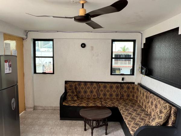 Hotel magallanes con cocineta 100 Metros de playa : photo 6 de la chambre chambre lits jumeaux avec salle de bains privative