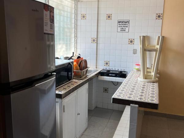 Hotel magallanes con cocineta 100 Metros de playa : photo 8 de la chambre chambre lits jumeaux avec salle de bains privative