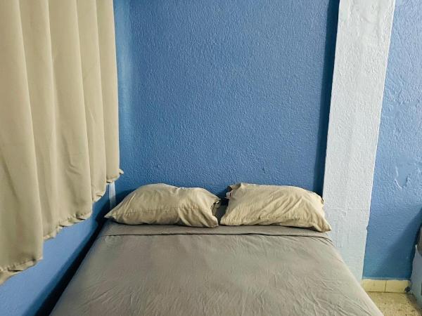 Hotel magallanes con cocineta 100 Metros de playa : photo 4 de la chambre chambre double