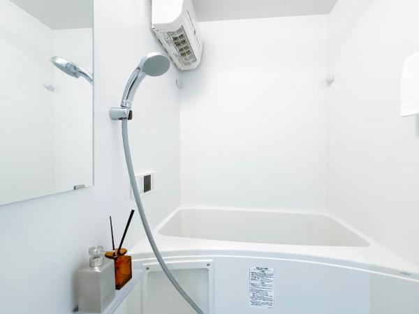 japan house nishishinjuku : photo 4 de la chambre chambre lits jumeaux - vue sur jardin