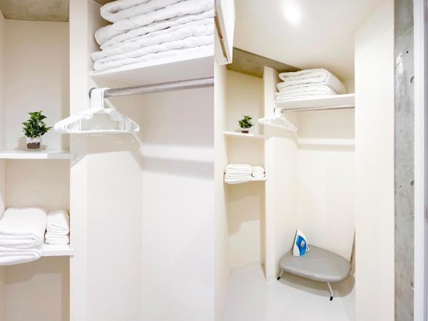 japan house nishishinjuku : photo 9 de la chambre chambre lits jumeaux - vue sur jardin