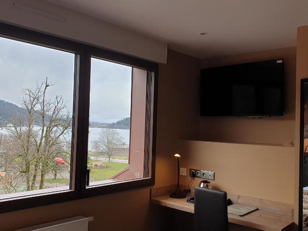 Les Loges Du Parc : photo 9 de la chambre chambre double avec vue sur le lac - annexe