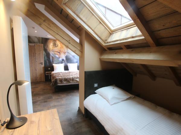 Les Loges Du Parc : photo 5 de la chambre chambre triple pmr - renard - annexe