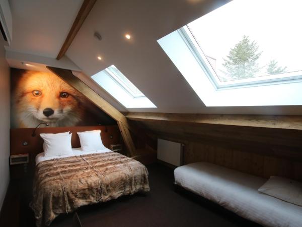 Les Loges Du Parc : photo 1 de la chambre chambre triple avec baignoire - renard - annexe