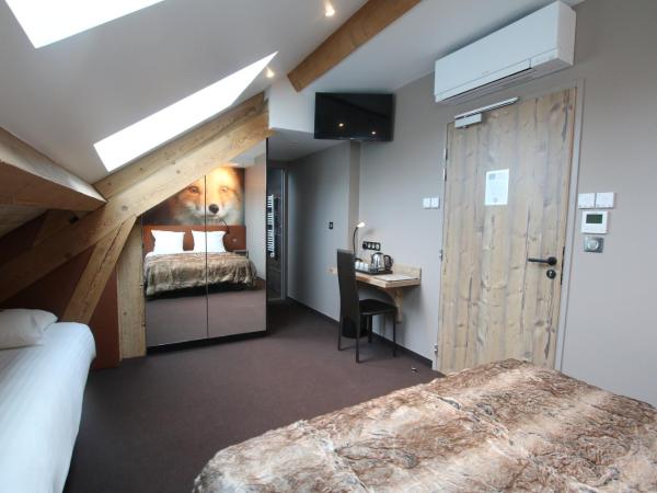 Les Loges Du Parc : photo 2 de la chambre chambre triple avec baignoire - renard - annexe