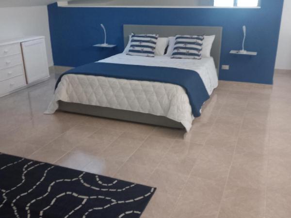 Wendy House Apartament : photo 2 de la chambre suite deluxe avec baignoire spa