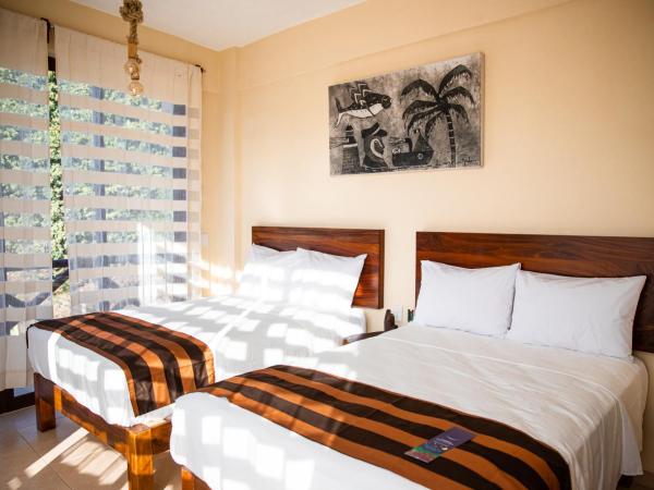 Hotel Santa Cruz Punta Zicatela : photo 6 de la chambre chambre double avec 2 lits doubles