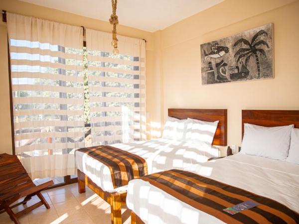 Hotel Santa Cruz Punta Zicatela : photo 9 de la chambre chambre double avec 2 lits doubles