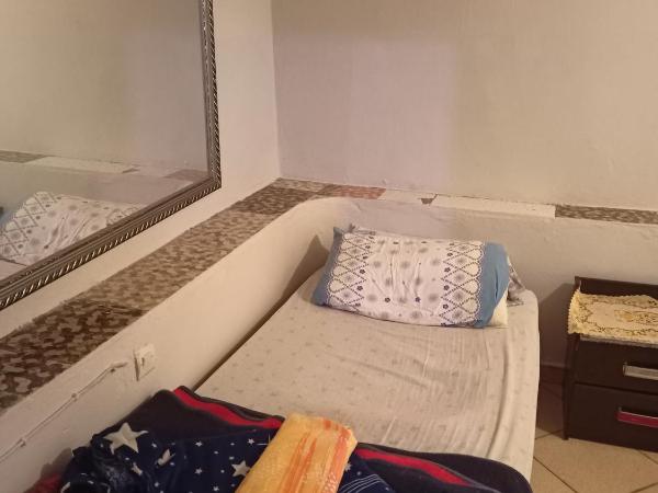 Booking and hosting medina : photo 2 de la chambre chambre triple Économique