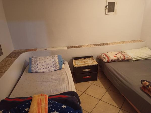 Booking and hosting medina : photo 4 de la chambre chambre triple Économique