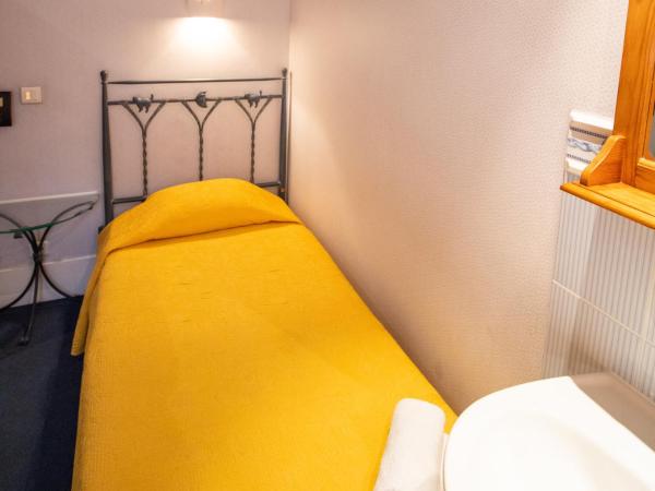 Port Royal Hotel : photo 2 de la chambre chambre simple avec salle de bains et toilettes communes
