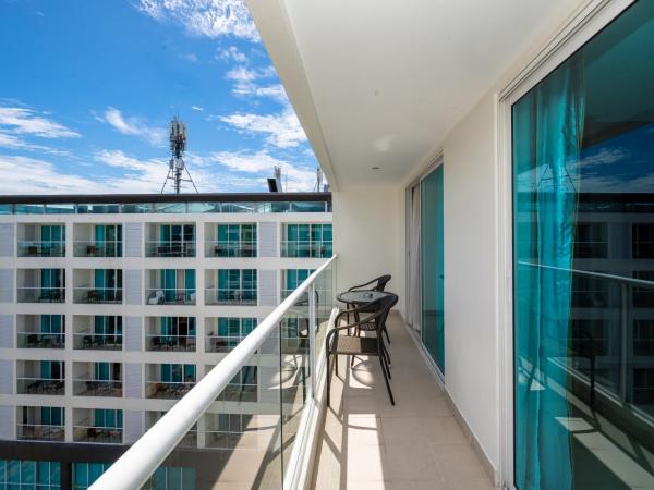 Centara Pattaya Hotel : photo 5 de la chambre hébergement lit king-size deluxe