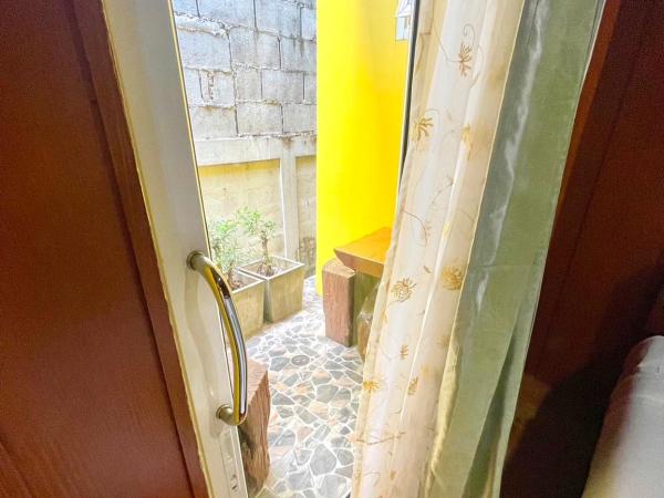 SuanTung Coffee & Guesthouse : photo 3 de la chambre chambre lits jumeaux avec salle de bains privative