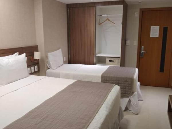 Pituba Praiamar Hotel : photo 4 de la chambre chambre triple exécutive