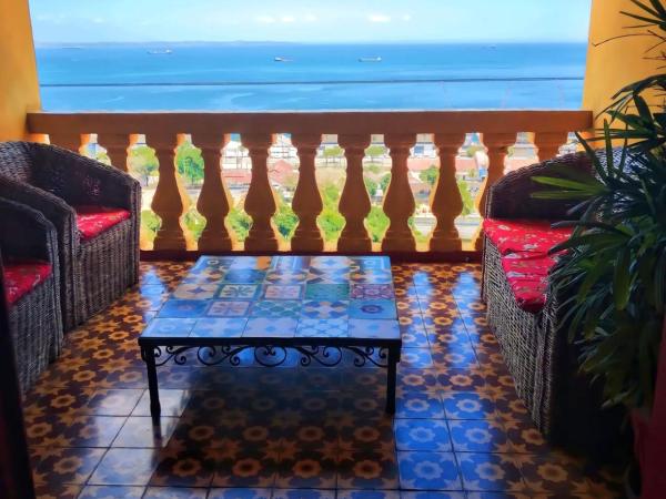 Pousada Des Arts : photo 5 de la chambre chambre quadruple avec balcon et vue sur la mer