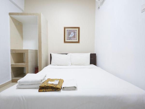 Mawar Villa, Batu Hitam : photo 3 de la chambre chambre lit queen-size deluxe