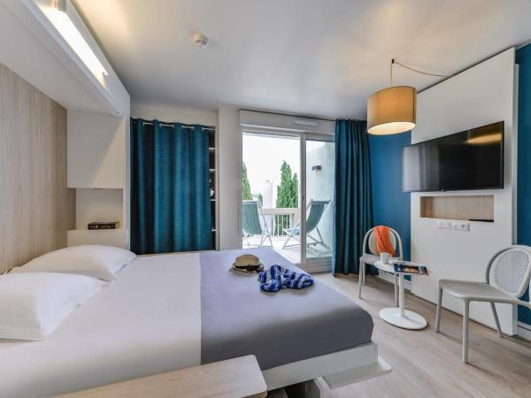 Belambra Clubs Port Camargue - Les Salins : photo 1 de la chambre chambre quadruple avec balcon 