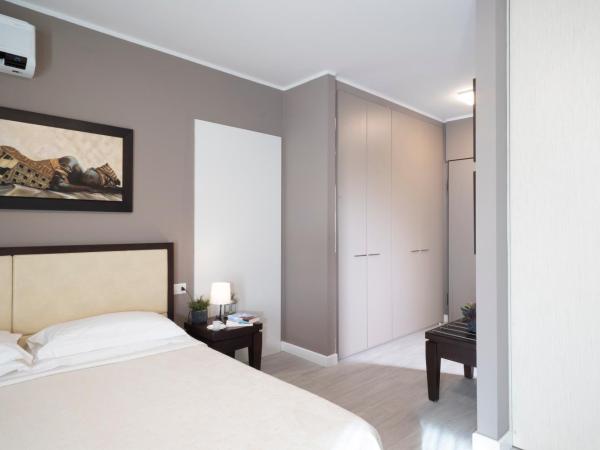 Quadra Key Easy Home In Florence : photo 2 de la chambre chambre double ou lits jumeaux
