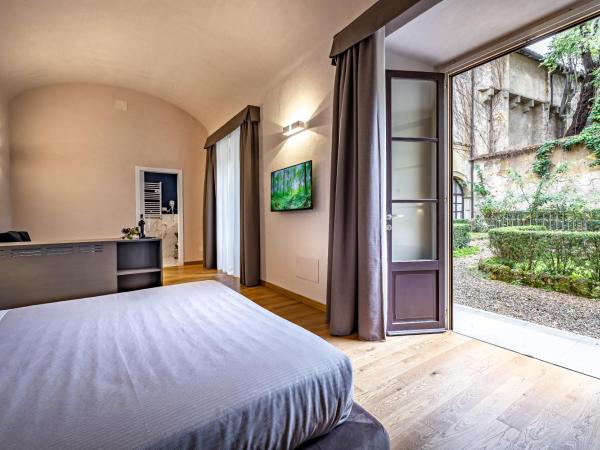 Hotel La Scaletta al Ponte Vecchio : photo 3 de la chambre chambre double ou lits jumeaux supérieure - vue sur jardin