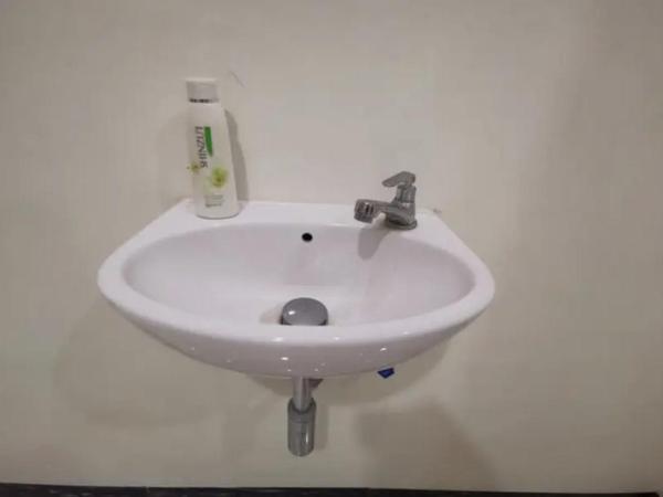 Griya Mataram Kotagede Mitra RedDoorz : photo 5 de la chambre chambre lits jumeaux standard