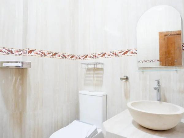 Griya Mataram Kotagede Mitra RedDoorz : photo 7 de la chambre chambre double deluxe