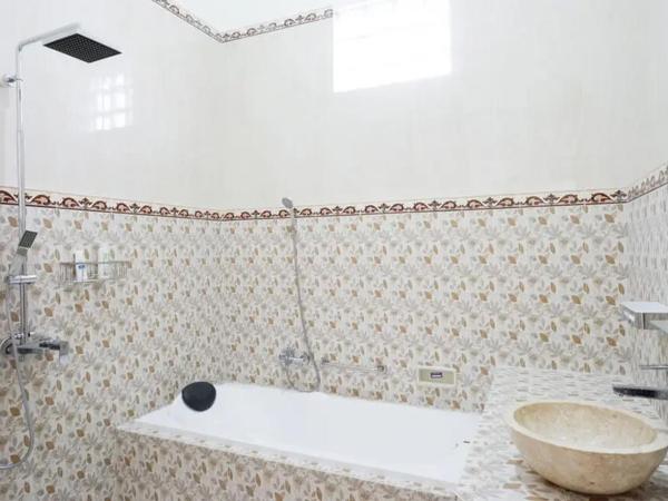 Griya Mataram Kotagede Mitra RedDoorz : photo 8 de la chambre chambre double deluxe