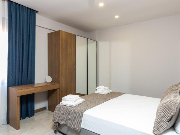 BİSUİTES : photo 6 de la chambre chambre double ou lits jumeaux avec terrasse