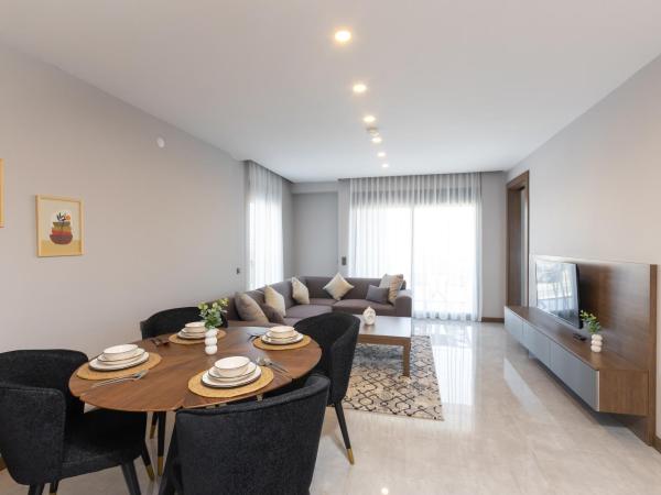 BİSUİTES : photo 1 de la chambre chambre quadruple avec balcon 